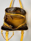 Bolsa Louis Vuitton Riveting Monogram