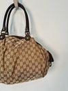 Bolsa Gucci Sukey Tote Monograma M