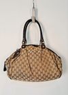 Bolsa Gucci Sukey Tote Monograma M