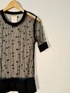 Blusa de tela estrelada