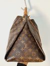 Bolsa Louis Vuitton Artsy Monogram MM