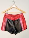 Shorts NK couro
