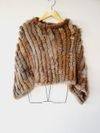 Poncho em pele