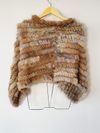 Poncho em pele
