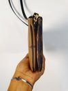 Bolsa Louis Vuitton Monogram Giant Reverse Pochette 
