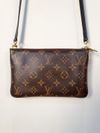 Bolsa Louis Vuitton Monogram Giant Reverse Pochette 