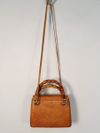 Bolsa Serpui Leona