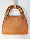 Bolsa Serpui Leona