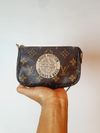 Bolsa Louis Vuitton Pochette Accessoires Mini 