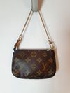 Bolsa Louis Vuitton Pochette Accessoires Mini 