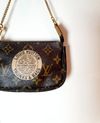 Bolsa Louis Vuitton Pochette Accessoires Mini 