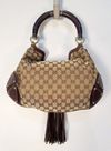 Bolsa Gucci GG Canvas Mink Indy 