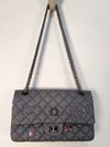 Bolsa Chanel 2.55 Reissue Space Charms 225 Flap