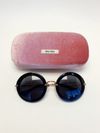 Óculos Miu Miu Noir 