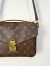 Bolsa Louis Vuitton Pochette Métis 