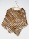 Poncho em pele