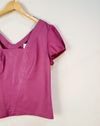 Blusa Angela Gigante couro