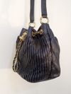 Bolsa Chanel CC Drawstring Bucket Bag 