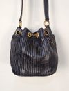 Bolsa Chanel CC Drawstring Bucket Bag 