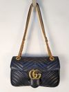 Bolsa Gucci GG Marmont Matelassê pequena 