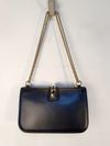 Bolsa Valentino Glam Lock Rockstud Medium 