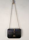 Bolsa Valentino Glam Lock Rockstud Medium 