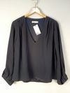 Blusa NV