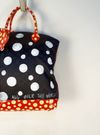 Bolsa Louis Vuitton Yayoi Kasuma Lockit MM 