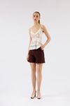 SHORTS COM RECORTES LEA