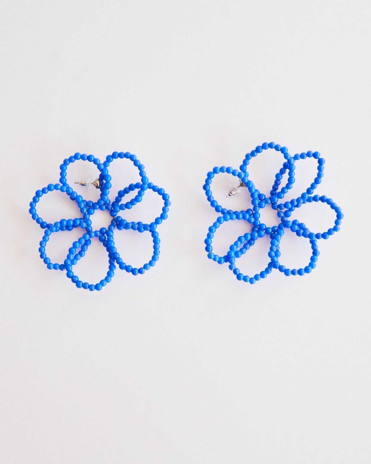 Brinco Maxi Flor Pétala Vazada Azul