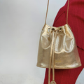 BAG CASTANHEIRAS DOURADA