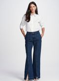 Calça Jeans BootCut Abertura Barra