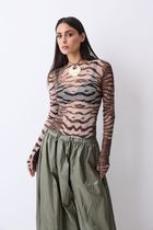 Foto do produto Blusa Tule Manga Tigre