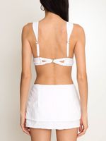 Conjunto top com fecho nas costas e mini saia AMIR SLAMA+JADE JADE