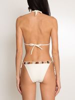 Conjunto de biquini top frente única e tanga de amarrar bordado