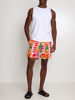 Shorts estampados cós elastico e bolsos laterais