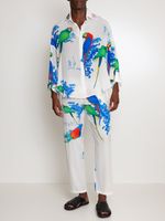 Calça estampada cós elastico com bolsos  
