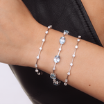 PULSEIRA FIO FACA TOPÁZIO SKY OVAL E MOISSANITE PRATA
