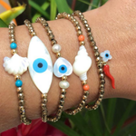 PULSEIRA MADREPÉROLA ESTRELA DO MAR, TURQUESA E HEMATITA