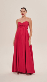 Vestido longo,tomara que caia, com laço, em tecido tecnológico.