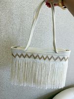 BOLSA COM FRANJAS MILAINE