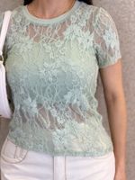 BLUSA RENDADA ASSIMÉTRICA COM CROPPED COBIANA
