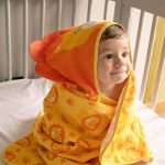 Toalha c/ capuz atoalhado e forro em fralda para bebê Leão Funny - Baby Joy