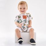 Macacão curto para bebê em meia malha Dinossauro - Up Baby