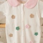Macacão longo c/ golinha para bebê em tricot Flores Colors - Mini & Co.