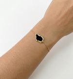 PULSEIRA REGULÁVEL ORGÂNICA COM RESINA PRETA BANHADO EM OURO 18K
