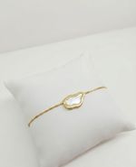 PULSEIRA REGULÁVEL ORGÂNICA MADREPÉROLA BANHADO EM OURO 18K