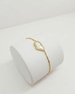 PULSEIRA REGULÁVEL ORGÂNICA MADREPÉROLA BANHADO EM OURO 18K
