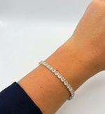 PULSEIRA REGULÁVEL RIVIERA CRAVEJADA COM ZIRCÔNIAS CRISTAL BANHADO EM PRATA 925