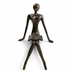 Figura Leitora em Alumínio
